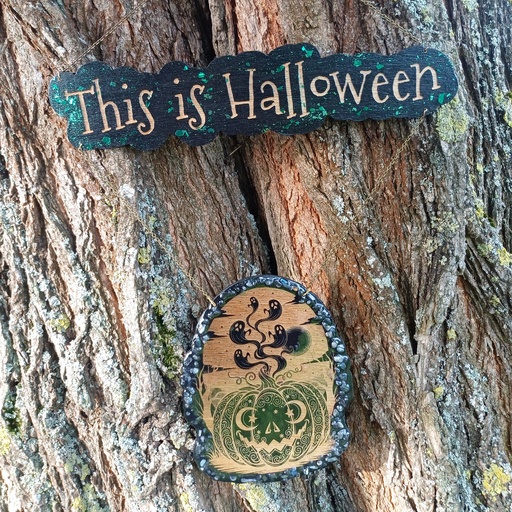 Halloween pumpkin wooden decoration with natural stones